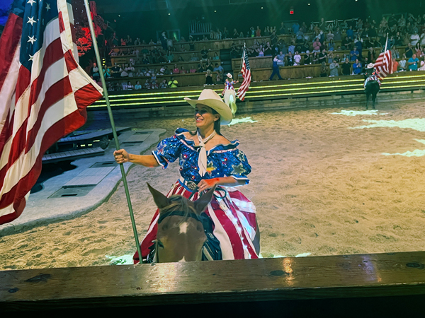 cowgirl and USA flag