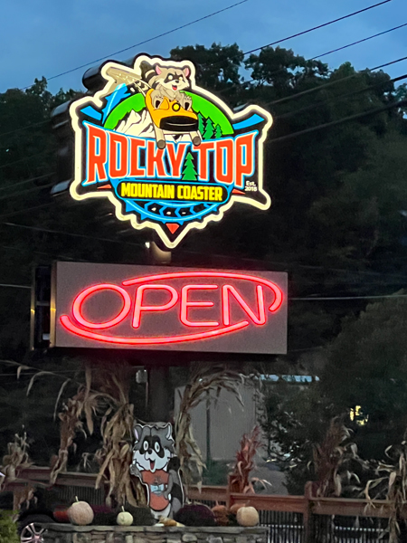 Rocky Top Mountain Coaste sign at night
