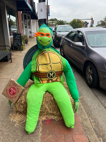 Mikey at Empire Pizza scarecrow