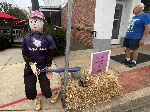 Purple Haze Travel Softball scarecrow