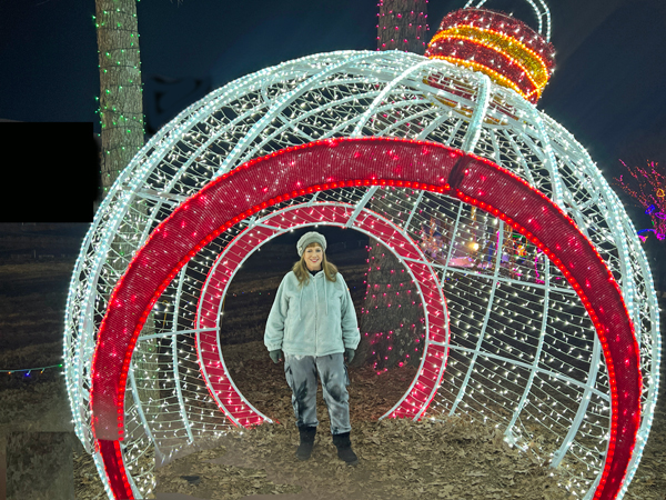 Karen Duquete in a walk-through ornament