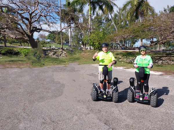 Lee and Karen Duquette on Segways in the Bahamas