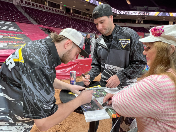 Karen Duquette getting the bikers autograph