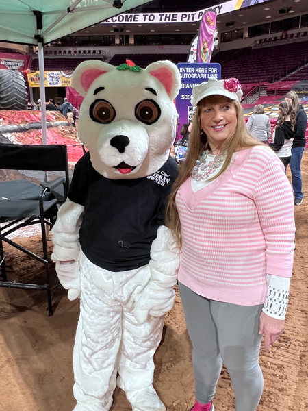 Karen Duquette with a big white bear