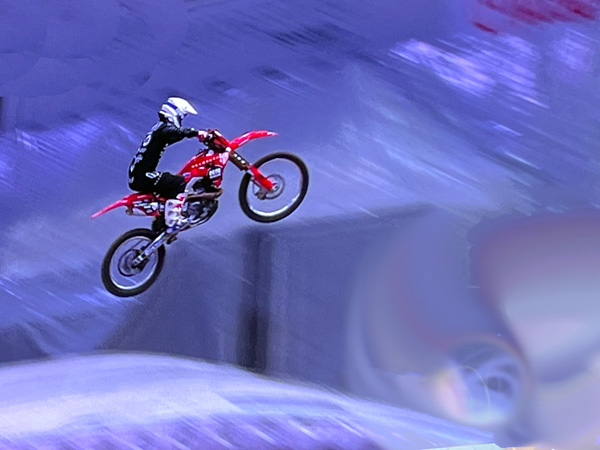Monster Jam biker high in the air