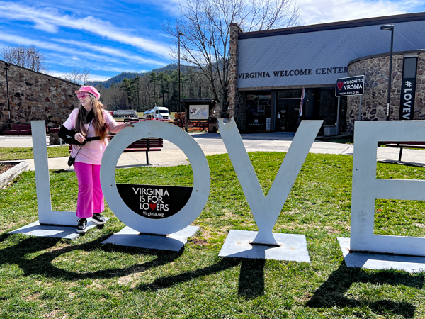 Karen Duquette at the Viriginia Love sign
