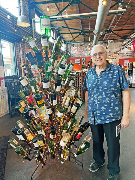 Lee Duquette and  the wine bottle tree
