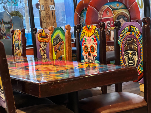 Mexican decor on the booths and tables