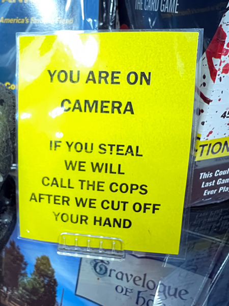 camera sign about cutting off your hand