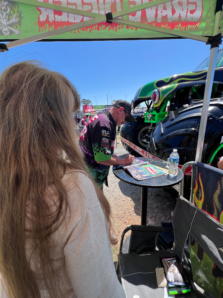 Adam Anderson signing book for Karen Duquette