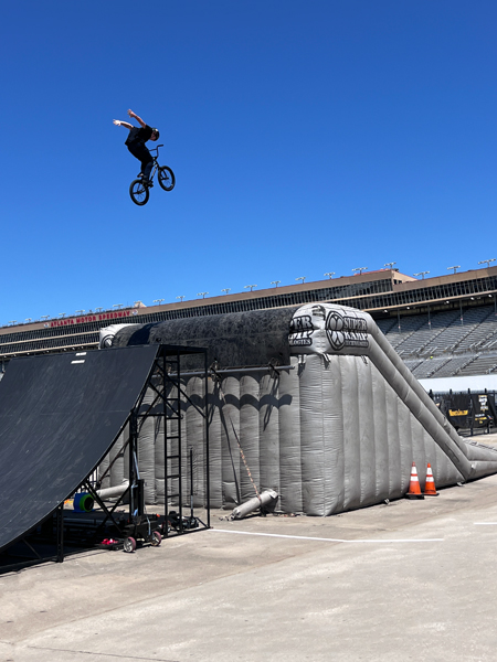 no hands biker high in the air