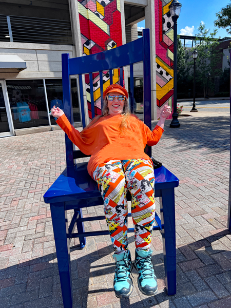 Karen Duquette in a giant chair