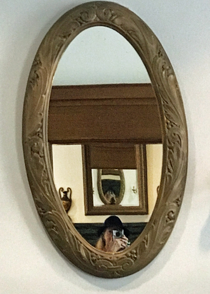 Karen Duquete in a mirror