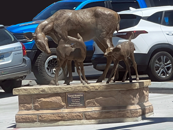 fawn and mom statues