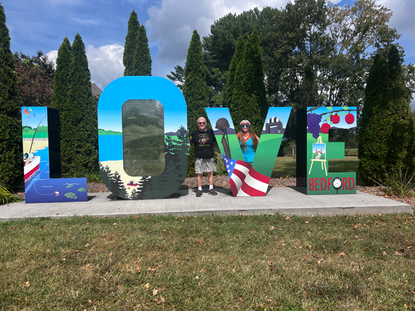 Lee and Karen Duquette at the Love Sign 