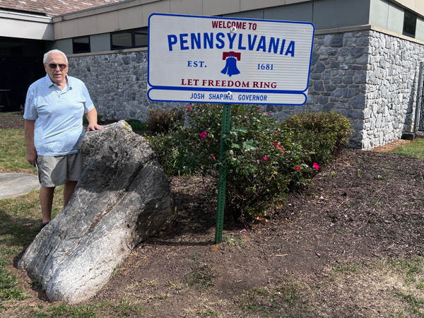 Lee Duquette at the PA Welcome sign