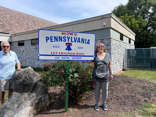 Lee and Karen Duquette at the PA Welcome sign