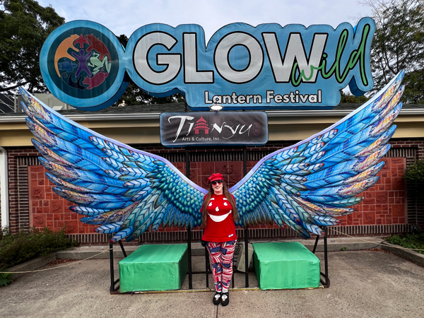 Karen Duquette at the Glow Wild Lantern Festival with wings