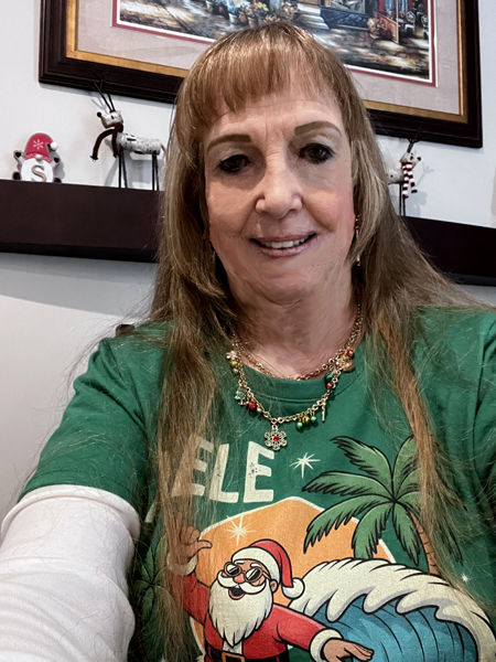 Karen Duquette in her Mele Kalikinmake shirt