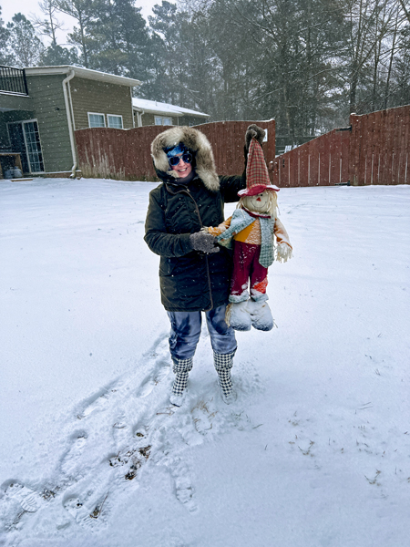 Kaen Duquette and a scarcrow