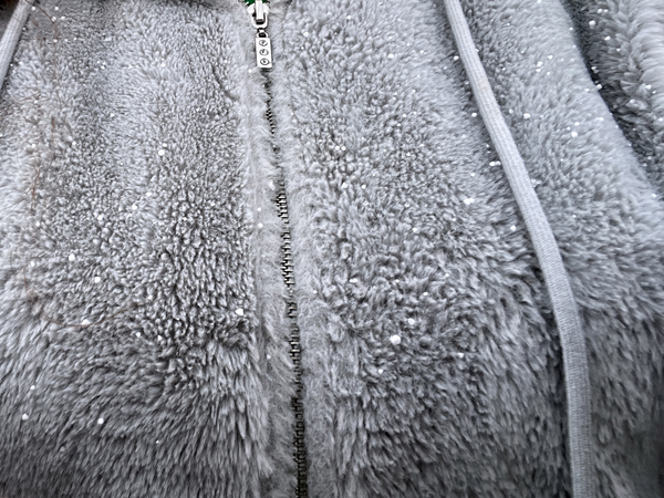 Snowflakes on Karen Duquette's jacket