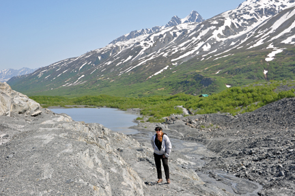 Karen Duquette looking back at the lake from up beside the glacier