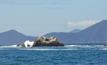 Watching the waves break upon the rocks 