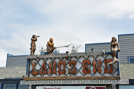 restaurant sign on top of building