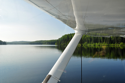 scenery taken out the closed window of the floatplane