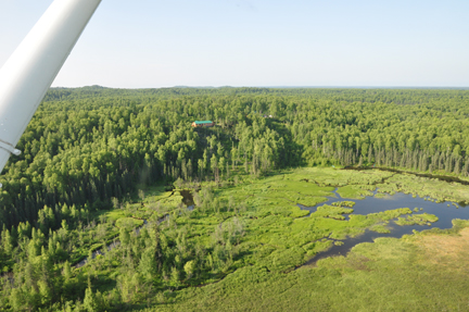 scenery taken out the closed window of the floatplane