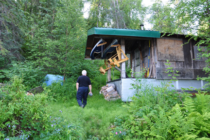 Lee Duquette approaches the cabin