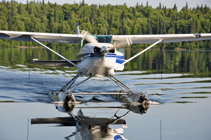 floatplane reflected in the lake