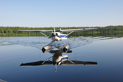 floatplane reflected in the lake