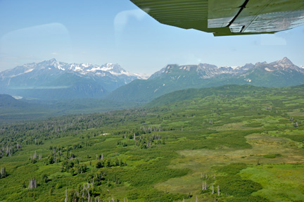 scenery taken out the closed window of the floatplane