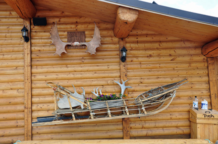 dog sled on cabin wall