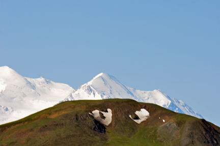 mountain with eyeballs