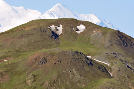 mountain with eyeballs