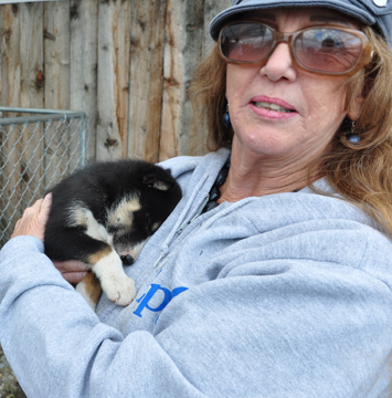 Karen Duquette and  a future sled dog