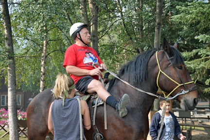 Lee Duuqette rides the horse in Alaska