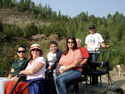 everyone on the dog cart