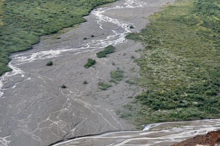 looking down the cliff at the river