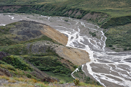 looking down the cliff at the river