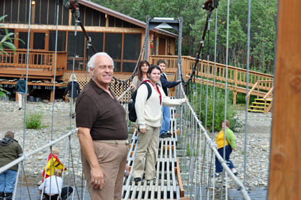 the family crossing the bridge