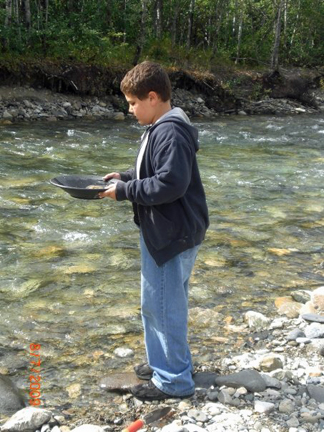 Alex panning for gold