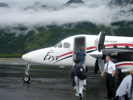 Alex and Kristen getting on the small plane