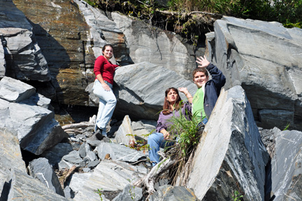 on the rocks by the waterfall