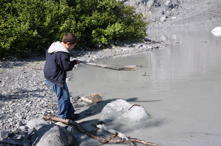 Alex playing with a chunk of ice