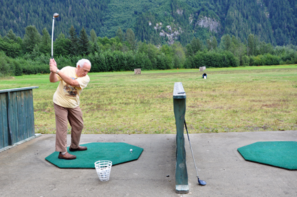 Lee Duquette at the driving range