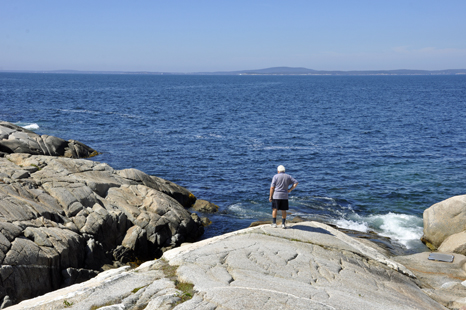 Lee Duquette checks out the waves in the Atlantic Ocean