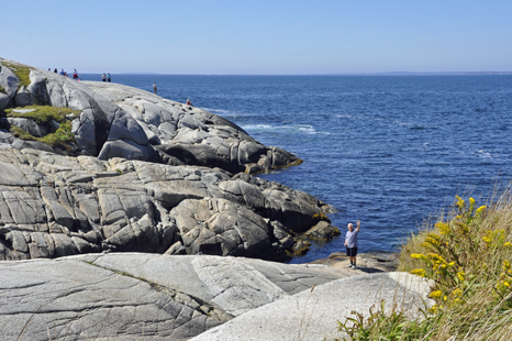 Lee Duquette checks out the waves in the Atlantic Ocean